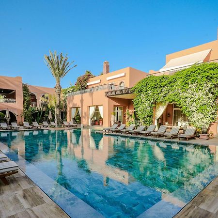 فندق تيكيدا جولف بالاس - ريلاى اند شاتو أغادير المظهر الخارجي الصورة The swimming pool at the hotel