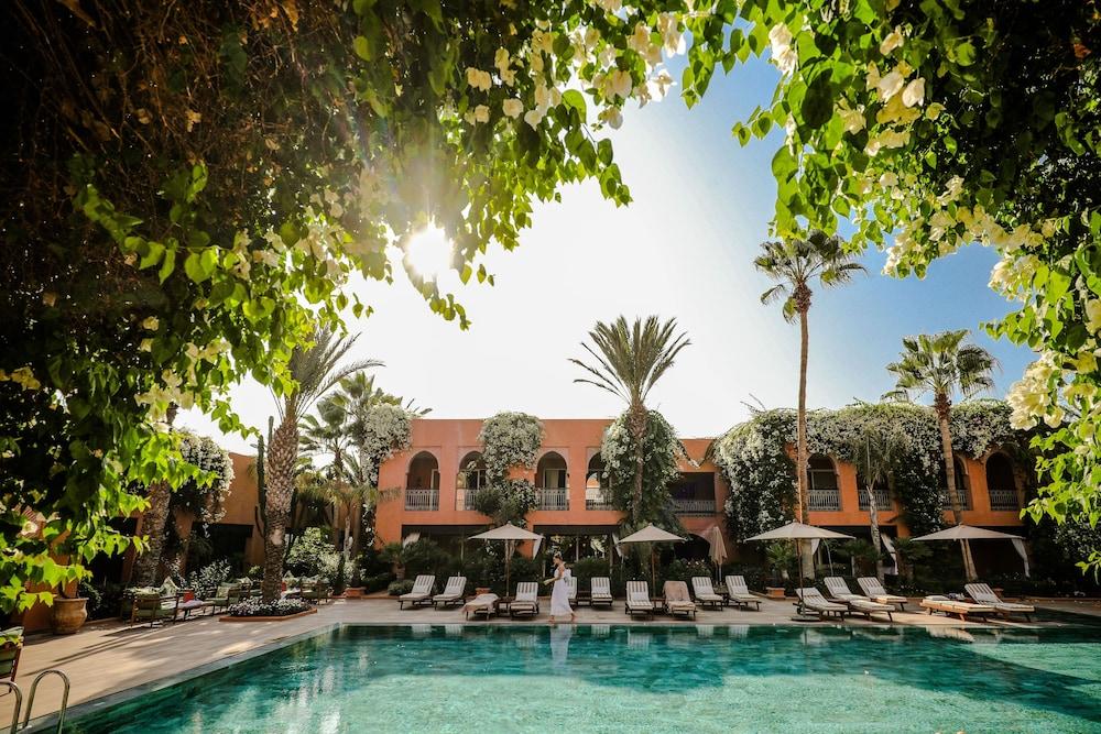 فندق تيكيدا جولف بالاس - ريلاى اند شاتو أغادير المظهر الخارجي الصورة The swimming pool at the hotel