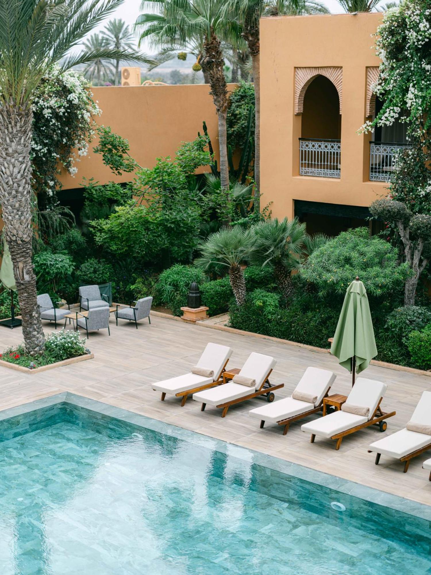 فندق تيكيدا جولف بالاس - ريلاى اند شاتو أغادير المظهر الخارجي الصورة The pool at the hotel
