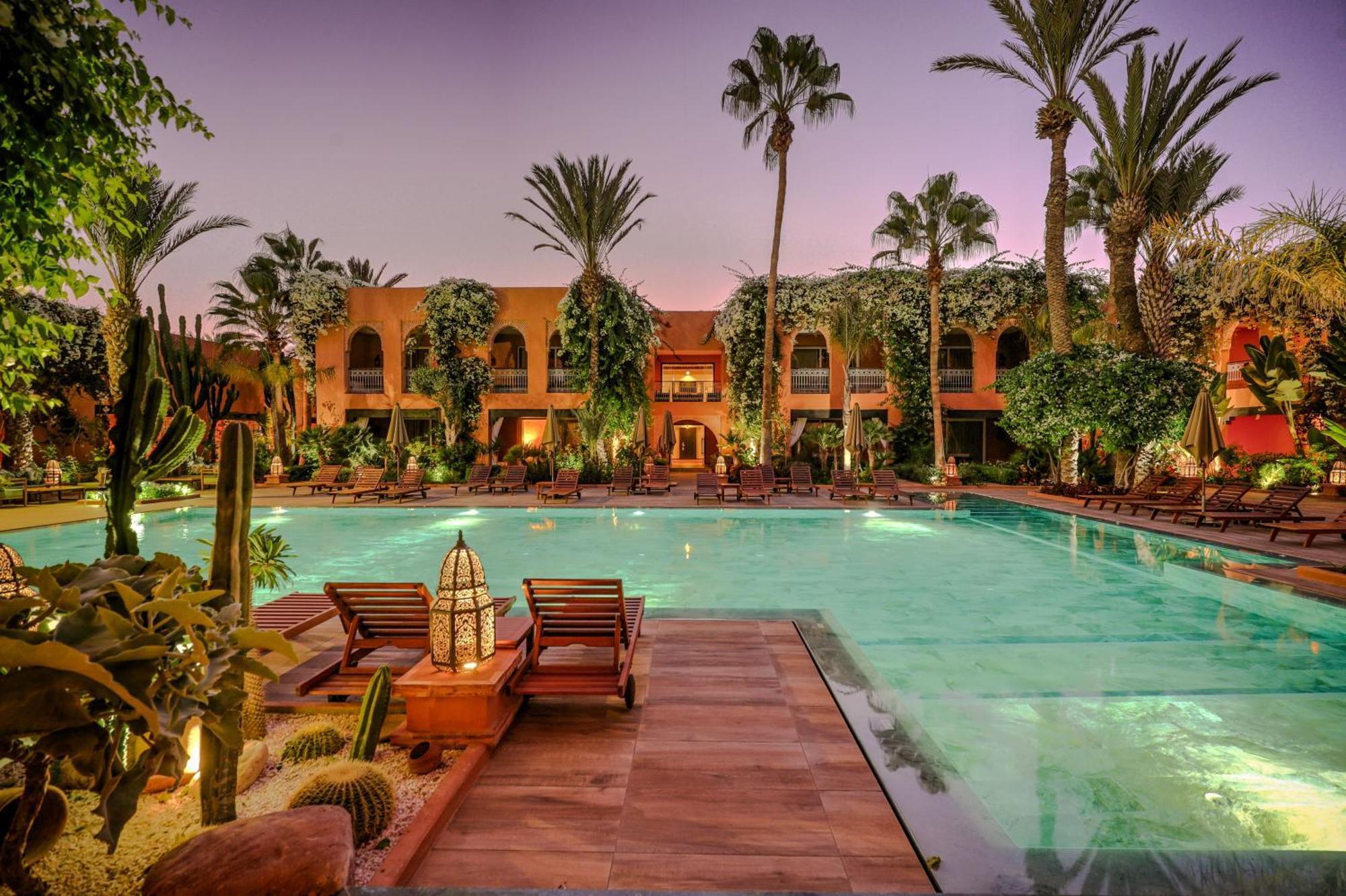 فندق تيكيدا جولف بالاس - ريلاى اند شاتو أغادير المظهر الخارجي الصورة The swimming pool at the hotel