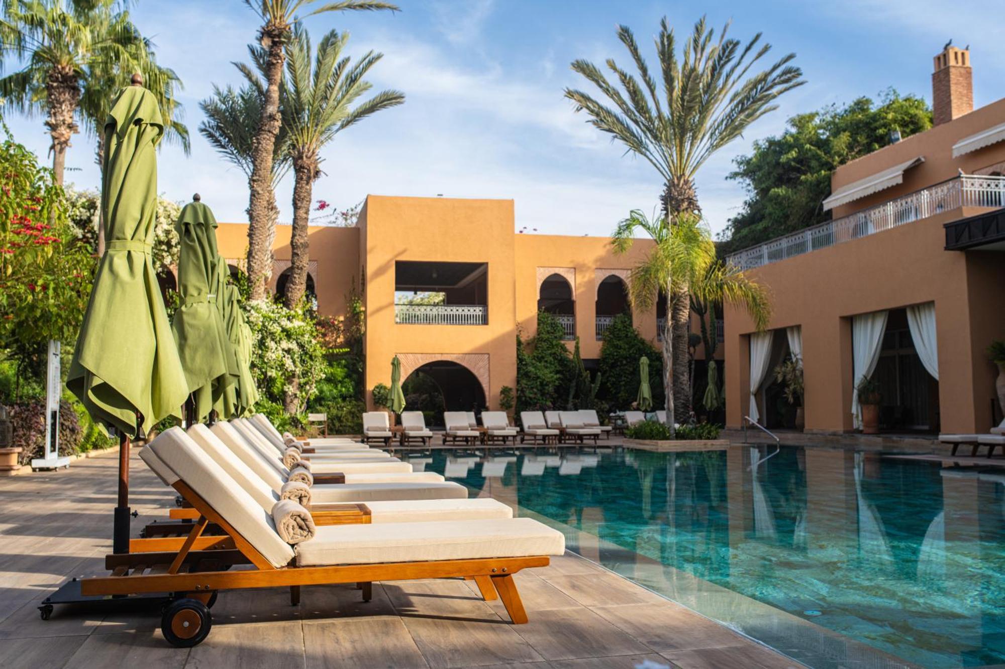 فندق تيكيدا جولف بالاس - ريلاى اند شاتو أغادير المظهر الخارجي الصورة The swimming pool at the hotel