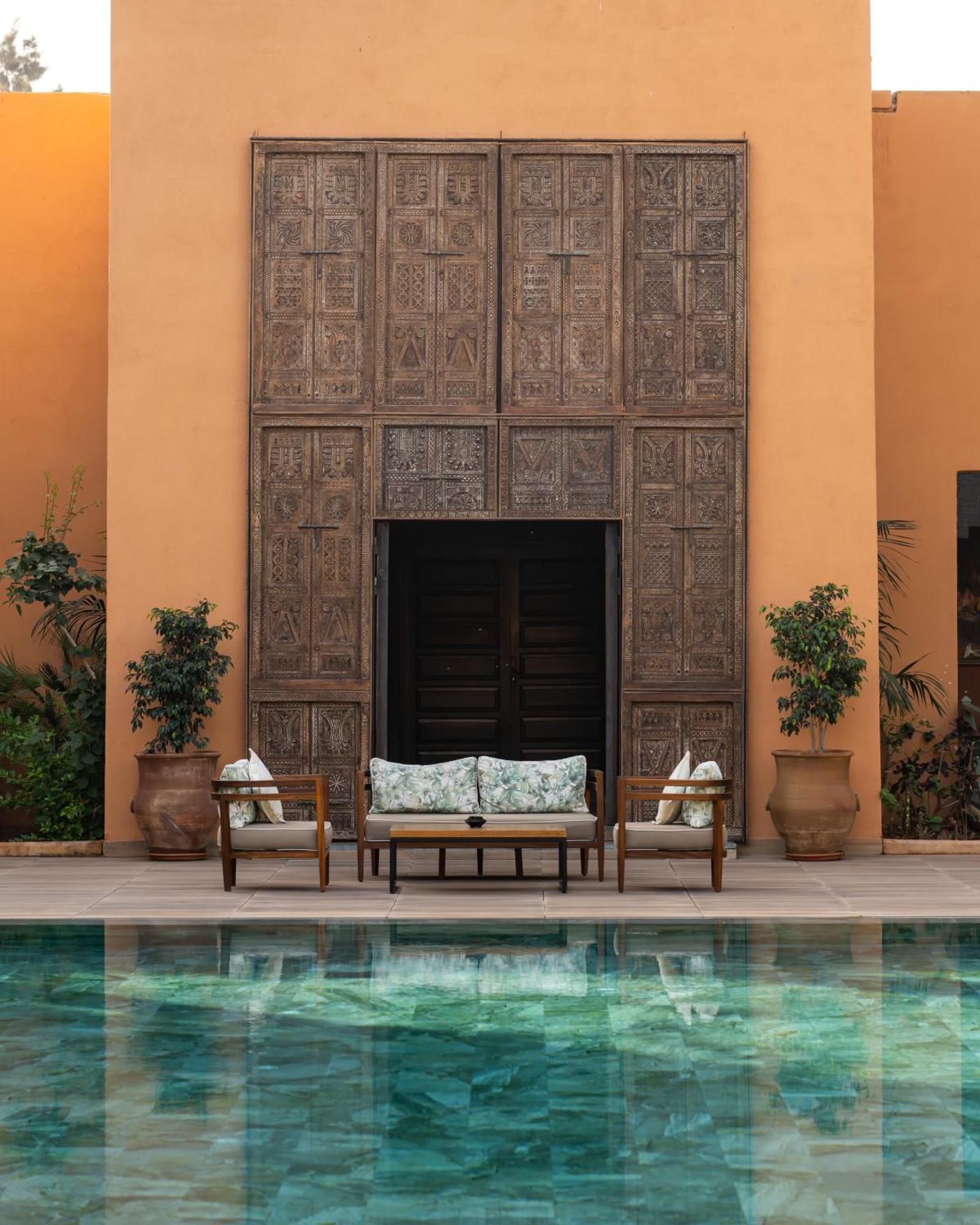 فندق تيكيدا جولف بالاس - ريلاى اند شاتو أغادير المظهر الخارجي الصورة The swimming pool at the B2 Boutique Hotel