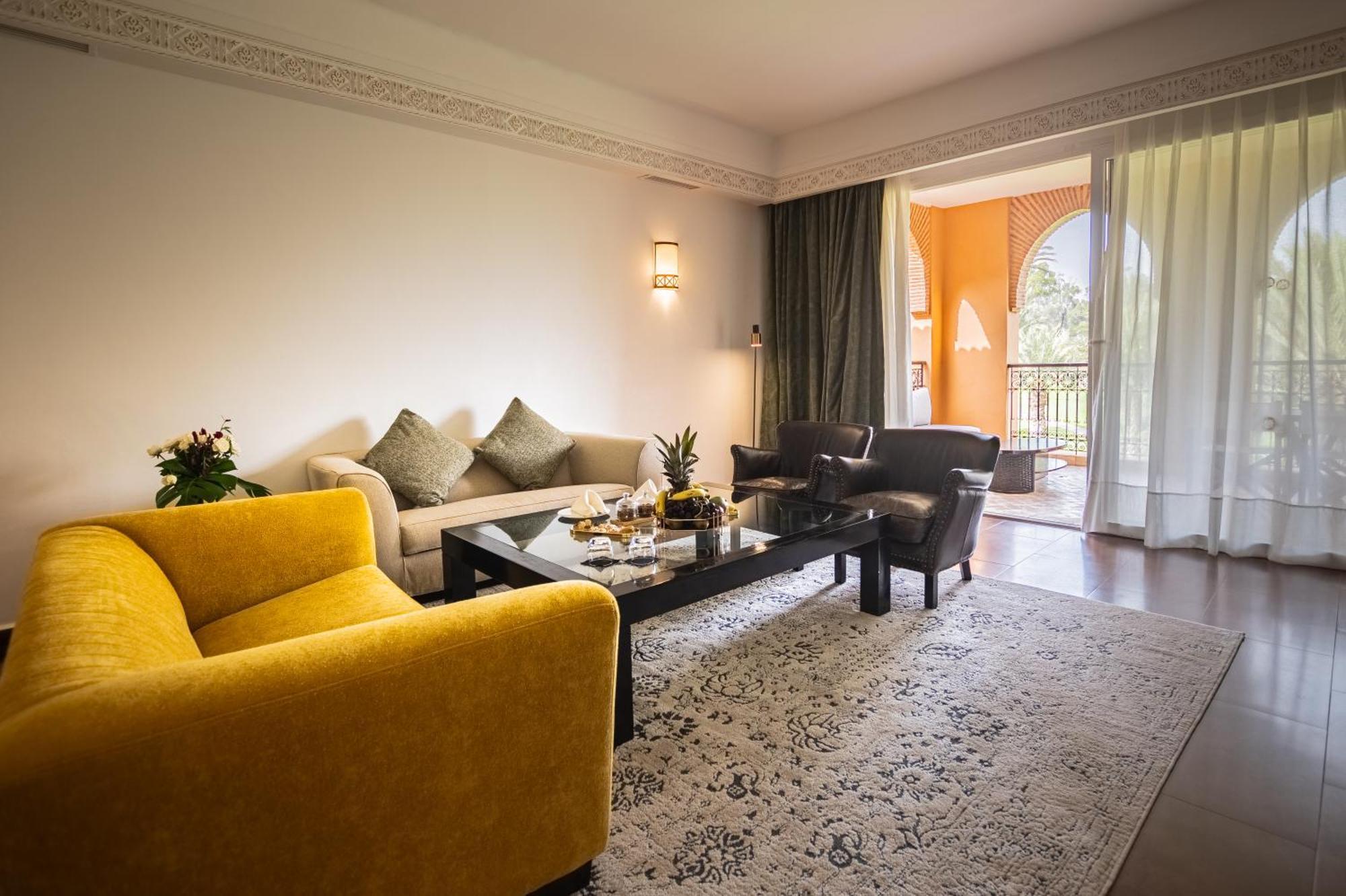 فندق تيكيدا جولف بالاس - ريلاى اند شاتو أغادير المظهر الخارجي الصورة A living room at the hotel