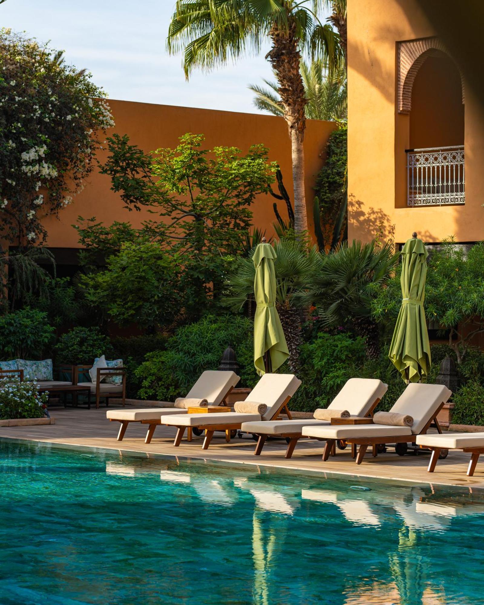 فندق تيكيدا جولف بالاس - ريلاى اند شاتو أغادير المظهر الخارجي الصورة The swimming pool at the Four Seasons Hotel, Marrakech