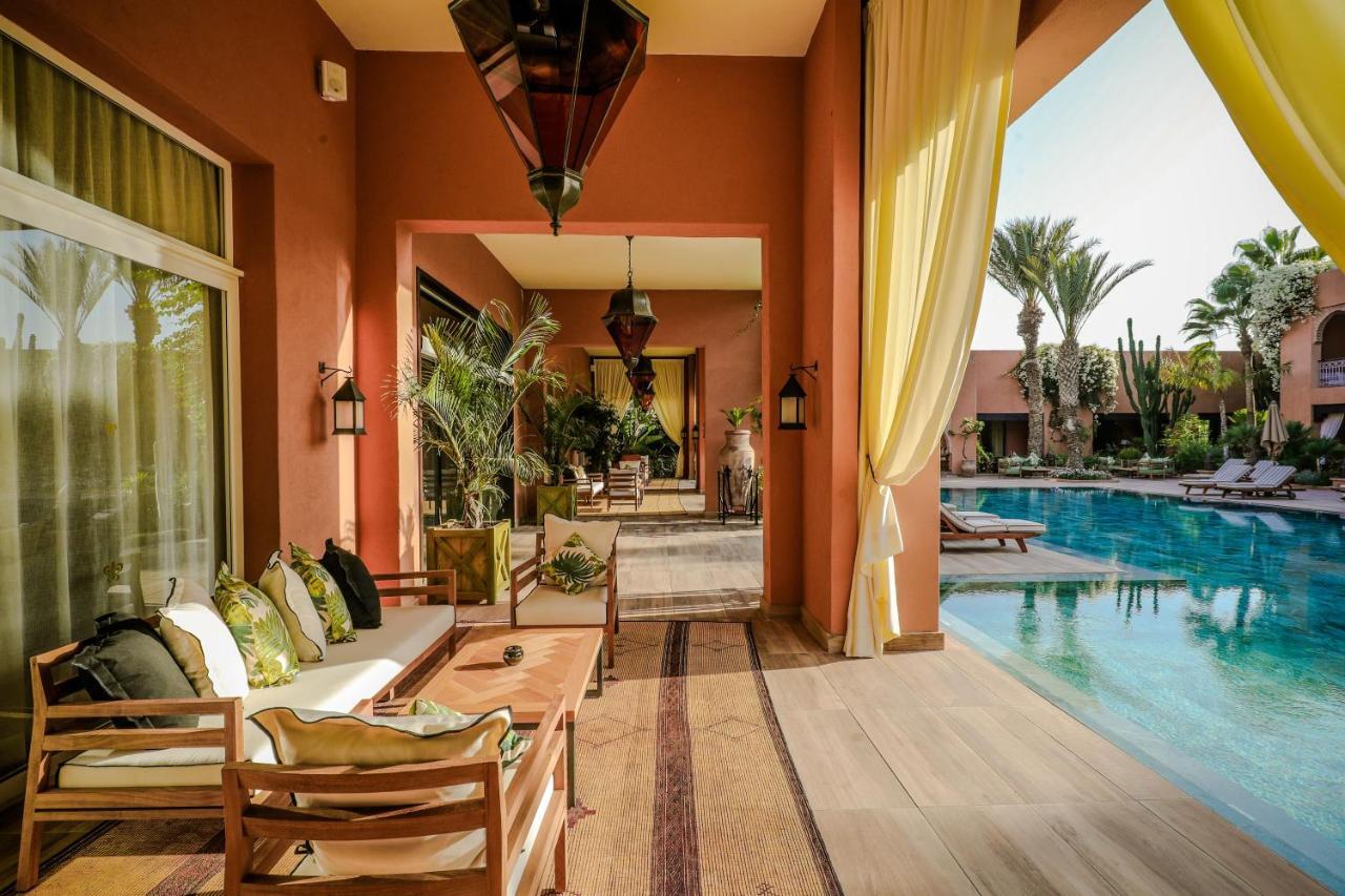 فندق تيكيدا جولف بالاس - ريلاى اند شاتو أغادير المظهر الخارجي الصورة The swimming pool at the hotel